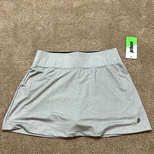 Prince moisture wicking skort with tags. Built in shorts. Brand new with tags.